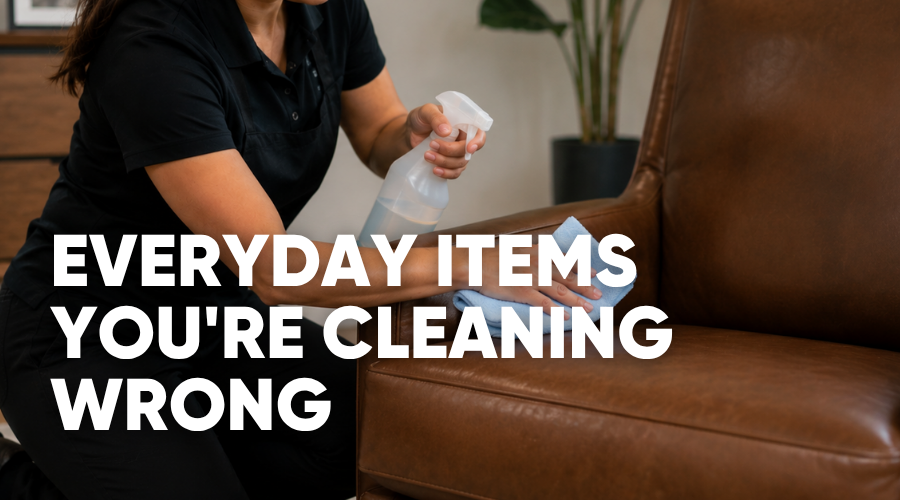 Professional cleaner wiping a leather chair with a microfiber cloth - Everyday Items You're Cleaning Wrong
