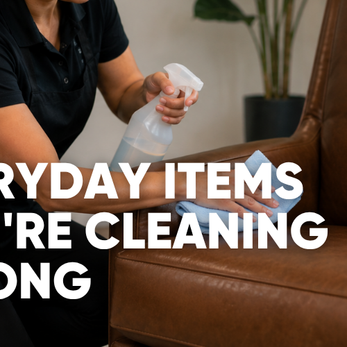 Professional cleaner wiping a leather chair with a microfiber cloth - Everyday Items You're Cleaning Wrong