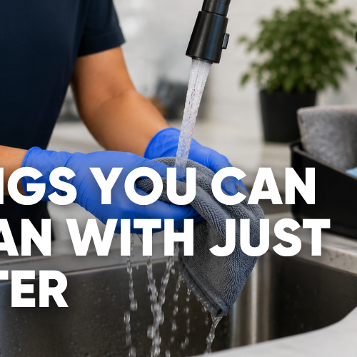 Cleaning supplies and a spray bottle of water on a counter, titled 20 Things You Can Clean With Just Water