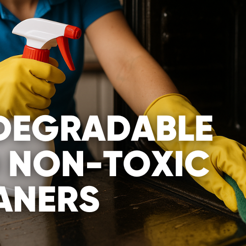 Person using biodegradable and non-toxic cleaners with spray bottle and sponge.