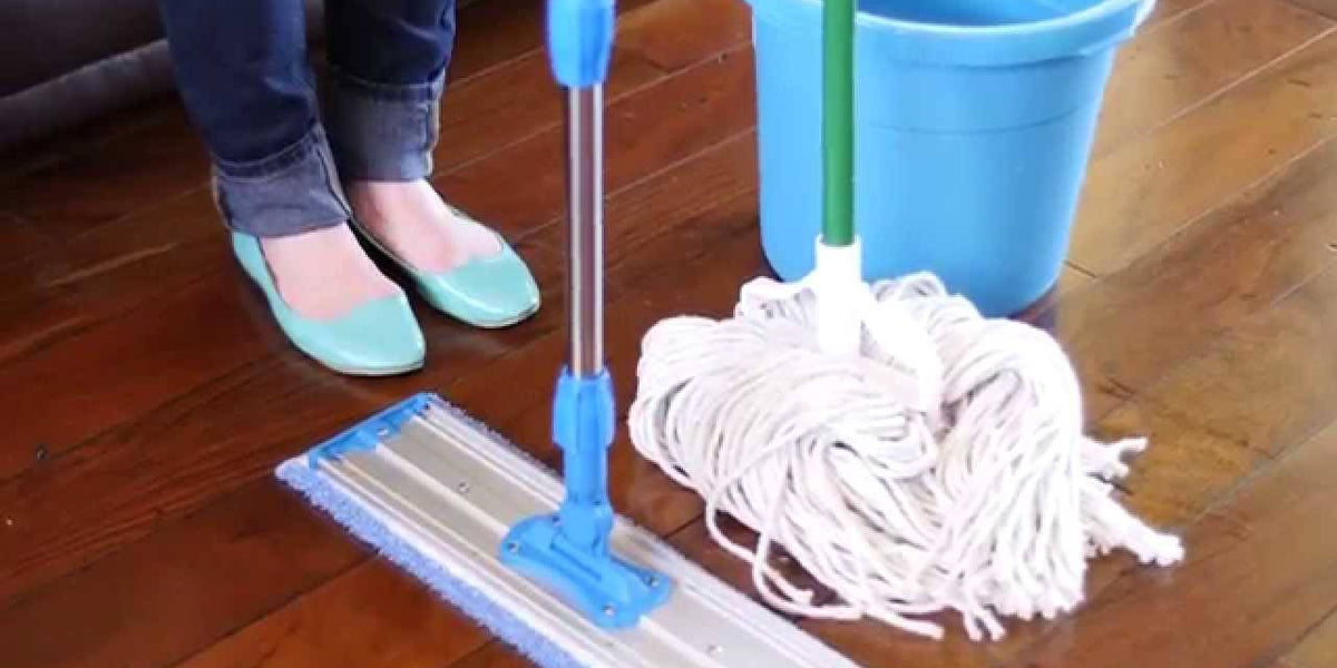 comparison of new vs worn microfiber mop head showing fraying and stains