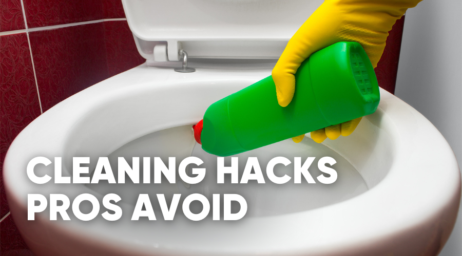 Person cleaning a toilet with a green bottle of cleaner.