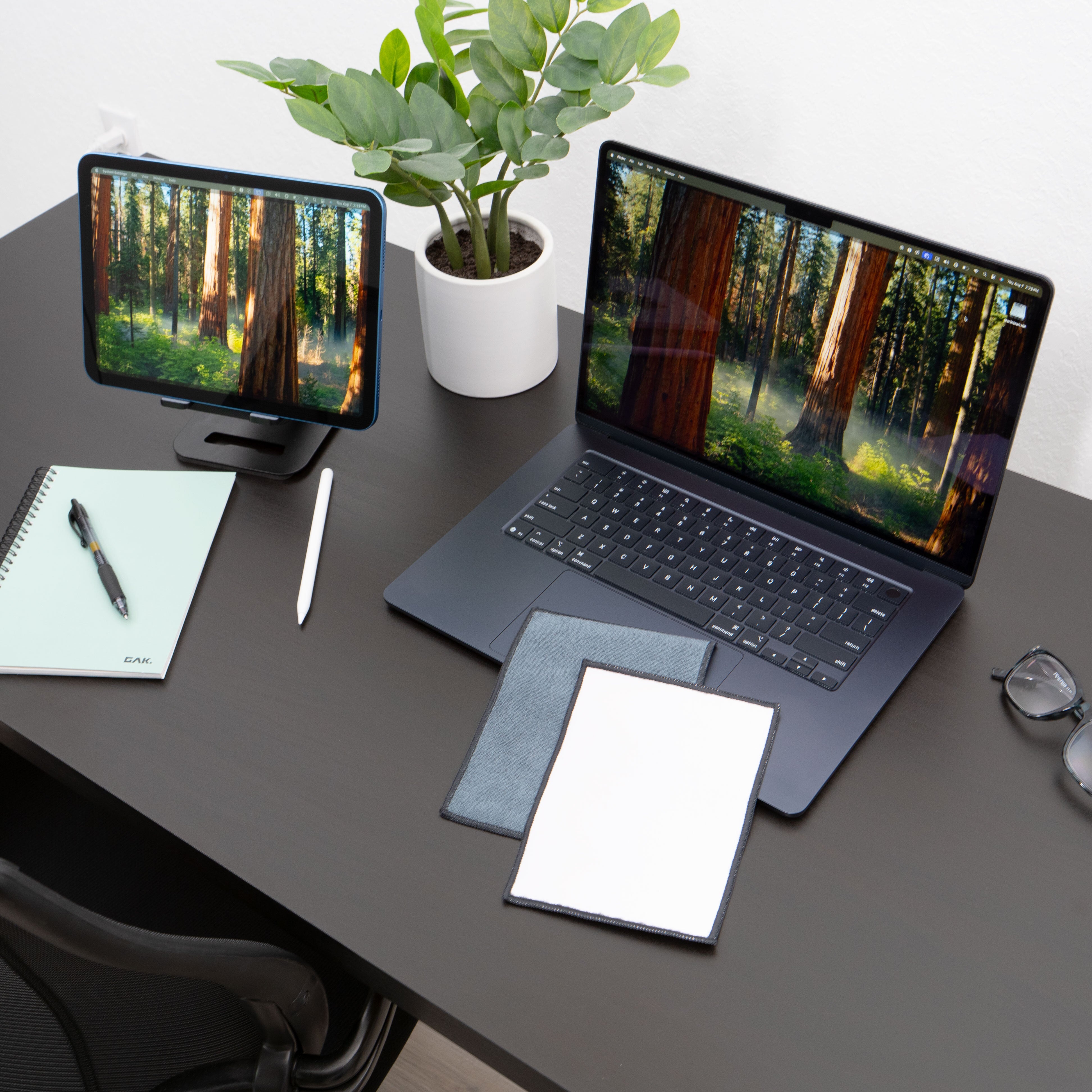 microfiber lens cloth on a desk and laptop