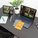 microfiber lens cloth on a desk and laptop