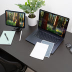 microfiber lens cloth on a desk and laptop