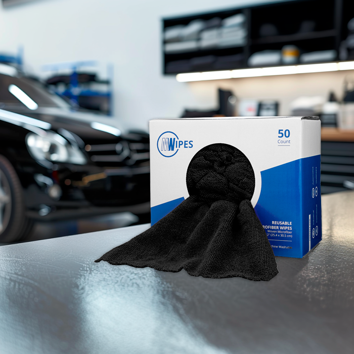 black microfiber shop rags on a countertop
