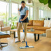 a woman mopping an apartment floor with a microfiber flat mop